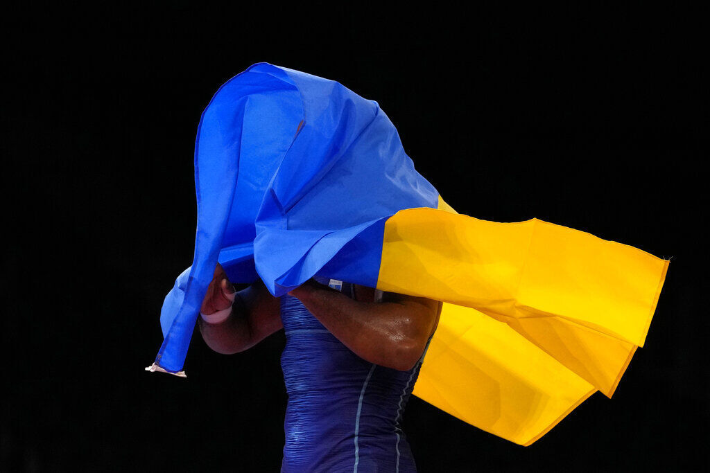 Tokyo Olympics Athletes and Flags Photo Gallery